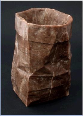 Baggin It rotblatt stone sculpture